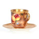 ROBERTS A ROYAL WORCESTER BLACK MARK CABINET CUP AND SAUCER richly gilt and painted with designs