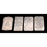 A COLLECTION OF FOUR CHINESE SILVER TABLETS with shallow relief decoration, app. 574g