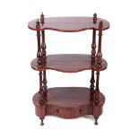 A 19TH CENTURY ROSEWOOD KIDNEY SHAPED THREE TIER WHAT NOT with turned supports and frieze draw to