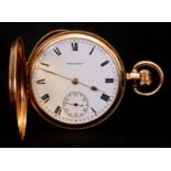 WALTHAM. AN EARLY 20TH CENTURY 18CT GOLD FULL HUNTER POCKET WATCH the engine turned case opening