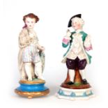 A LATE 19TH CENTURY CONTINENTAL COLOURED BISCUIT WARE AND PARTLY GLAZED STANDING FIGURE modelled