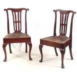 A PAIR OF EARLY 18TH CENTURY SIDE CHAIRS with shaped ears to the top rail above pierced splats and
