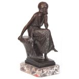 AFTER B.C.ZHENG A 20TH CENTURY ART DECO BRONZE SCULPTURE OF A SEATED LADY mounted on a veined marble