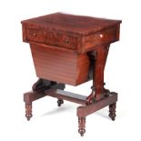 A 19TH CENTURY FLAME MAHOGANY WORKBOX with frieze drawer fitted with inkwell and pen rest above a