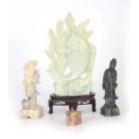 FOUR PIECES OF ORIENTAL JADE AND CARVED STONE comprising a Jade fish mounted on a wooden base 33cm