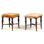 A PAIR OF MID 19TH CENTURY ROSEWOOD STOOLS with turned legs, splayed feet and turned cross