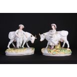 A PAIR OF 19TH CENTURY STAFFORDSHIRE COW AND STANDING FIGURE GROUPS depicting a farmer and milkmaid,
