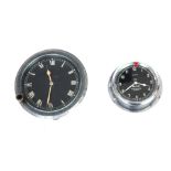 TWO VINTAGE CAR CLOCKS one by Smiths with winding bezel and black dial in a chrome case, the