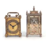 TWO EARLY 20TH CENTURY MANTEL CLOCKS the larger with silver plated nickel case with Roman chapter