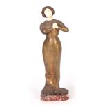 AN EARLY 20TH CENTURY ART DECO IVORY AND GILT BRONZE FIGURE OF A LADY with finely carved ivory