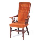 A LATE 19TH CENTURY STAINED FRUITWOOD BUTTON UPHOLSTERED ARMCHAIR with scrolled ring turned