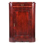 A LATE 19TH CENTURY FLAMED MAHOGANY FRENCH BIEDERMEIER STANDING CORNER CUPBOARD with moulded