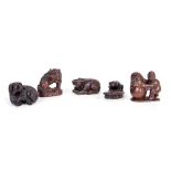 A COLLECTION OF FIVE JAPANESE HARDWOOD NETSUKE of various animals (5)