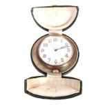 J.C. VICKERY, REGENT STREET. W AN EARLY 20TH CENTURY TRAVELLING CLOCK with moulded brass and