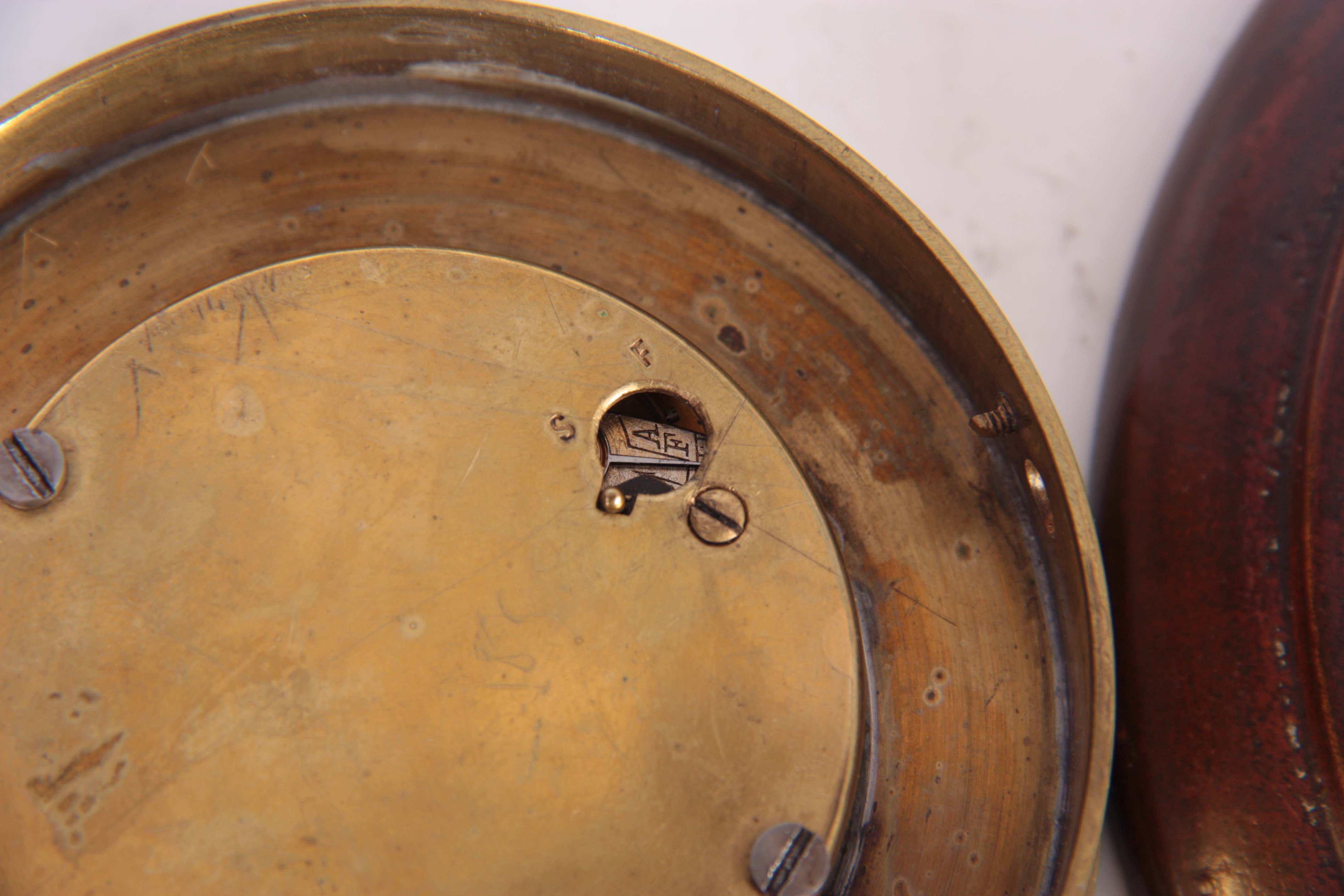 AN EARLY 20TH CENTURY CAR CLOCK having a brass case with bayonet fitted dashboard mount, the white - Image 4 of 4