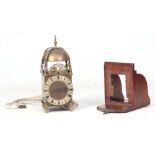S KNAPP, LINCOLN A 20TH CENTURY LANTERN CLOCK of typical form with brass bell straps supporting a