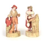A PAIR OF LATE 19TH CENTURY ROBINSON & LEADBEATER BOY AND GIRL FIGURE GROUPS depicted standing by