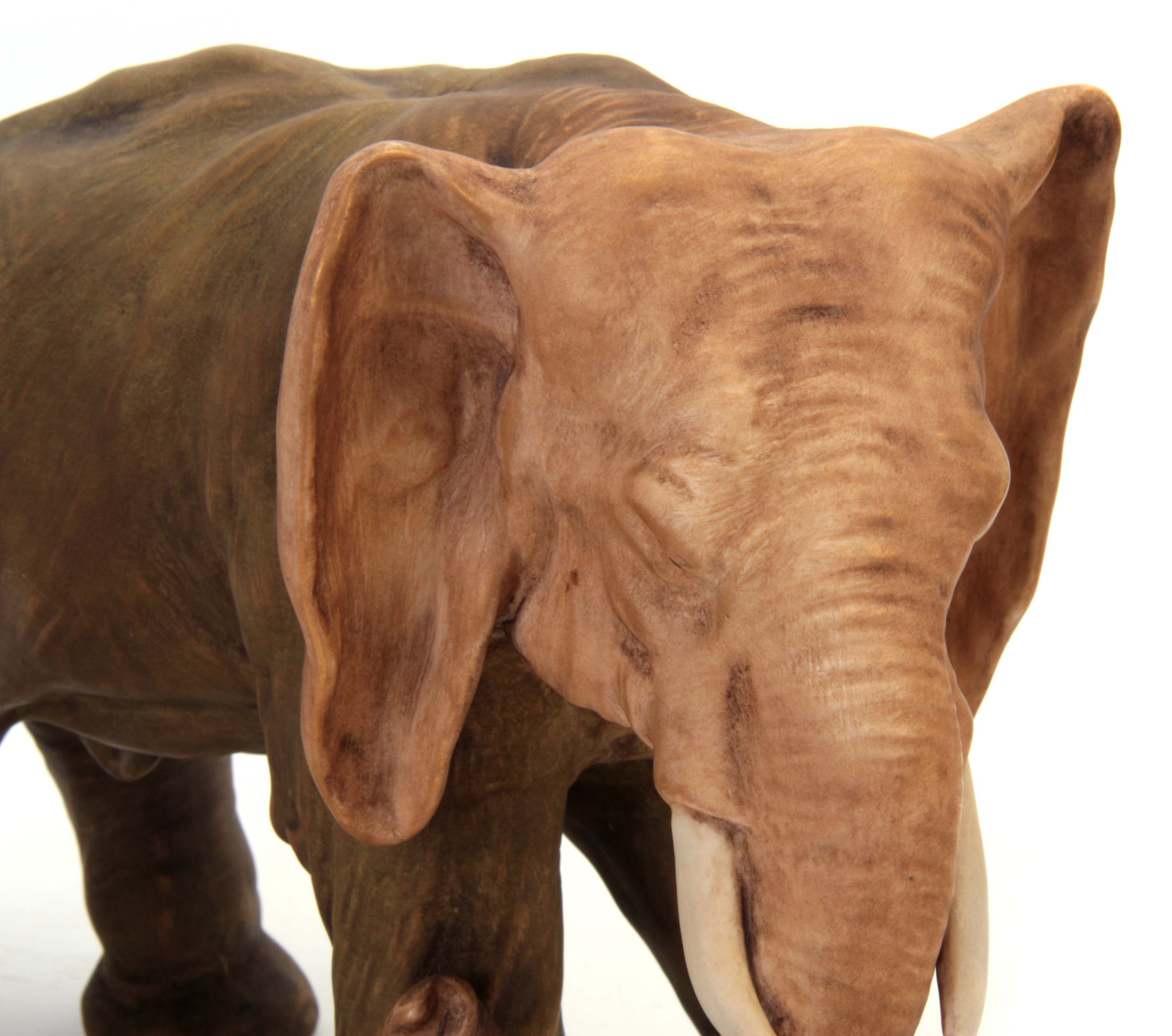 A ROYAL DUX LARGE ANIMAL MODEL of an elephant coloured in soft shades of green and brown with - Image 3 of 6