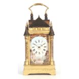 A LATE 19TH CENTURY FRENCH PORCELAIN PANELLED CARRIAGE CLOCK of large size, the castellated gilt and