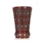 A 19TH CENTURY RUSSIAN SILVER AND IVORY INLAID BEAKER of tapering form with a moulded base 13cm high