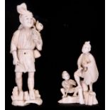 TWO 19TH CENTURY JAPANESE IVORY OKIMONOS modelled as men and child - tallest measuring 26cm high