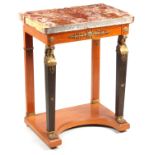 AN REGENCY STYLE FRENCH EMPIRE SATINWOOD AND GILT BRASS MOUNTED CONSOLE TABLE with veneered marble