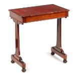 A LATE REGENCY ROSEWOOD LIBRARY TABLE with red tooled leather top and frieze drawer, on slender