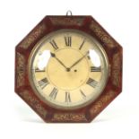 A REGENCY BRASS INLAID OCTAGONAL CASED WALL CLOCK the figured mahogany case with brass scroll inlaid