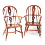 A RARE PAIR OF MID 19TH CENTURY CHILD'S YEW-WOOD WINDSOR ARMCHAIRS with hooped backs and Christmas