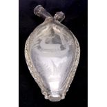 A 19TH CENTURY BOHEMIAN DOUBLE SIDED CLEAR GLASS GIMMEL FLASK of flattened tapering shouldered