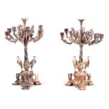 A MASSIVE AND IMPORTANT PAIR OF 19TH CENTURY SILVER PLATE NINE BRANCH TABLE CANDELABRA BEARING