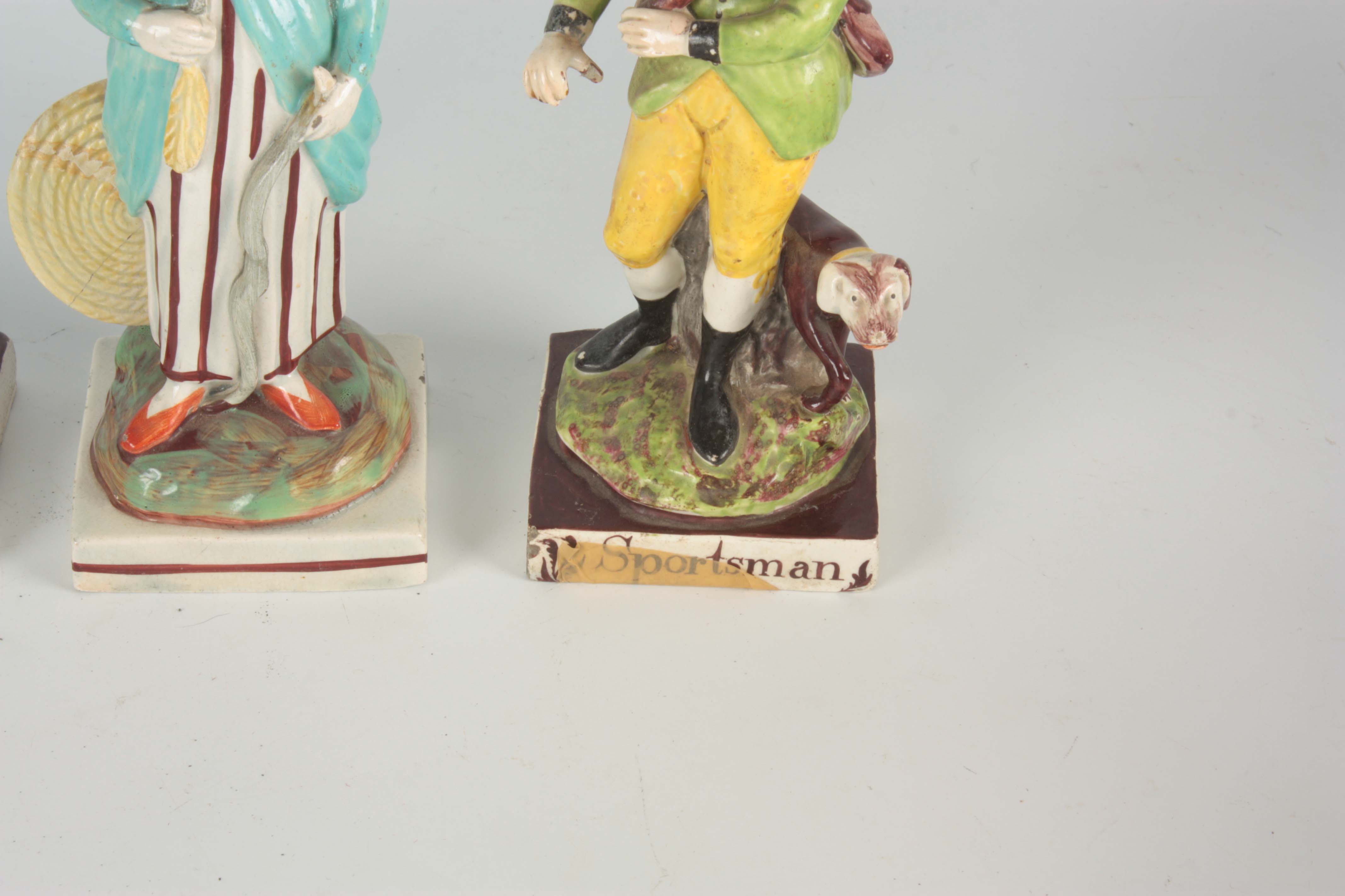 A PAIR OF 19TH CENTURY STAFFORDSHIRE STANDING FIGURES titled 'SPORTSMAN' and 'ARCHER' 18cm high - Image 3 of 4