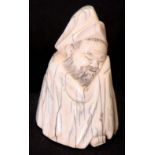 A CHINESE CARVED MAMMOTH TUSK modelled as a sleeping man, hat and gown 9cm high