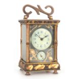 A FRENCH EARLY 20TH CENTURY JAPANESQUE CARRIAGE CLOCK the case with gilt and patinated bronze