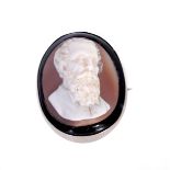 A 19TH CENTURY SILVER MOUNTED OVAL CAMEO BUST PORTRAIT BROOCH finely carved in high relief as the