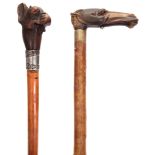 TWO EARLY 20TH CENTURY AUTOMATON WALKING CANES the first with wooden handle modelled as a dogs