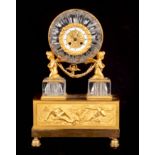 A 19TH CENTURY FRENCH CRYSTAL AND ORMOLU FIGURAL MANTEL CLOCK the case having a circular cut-crystal