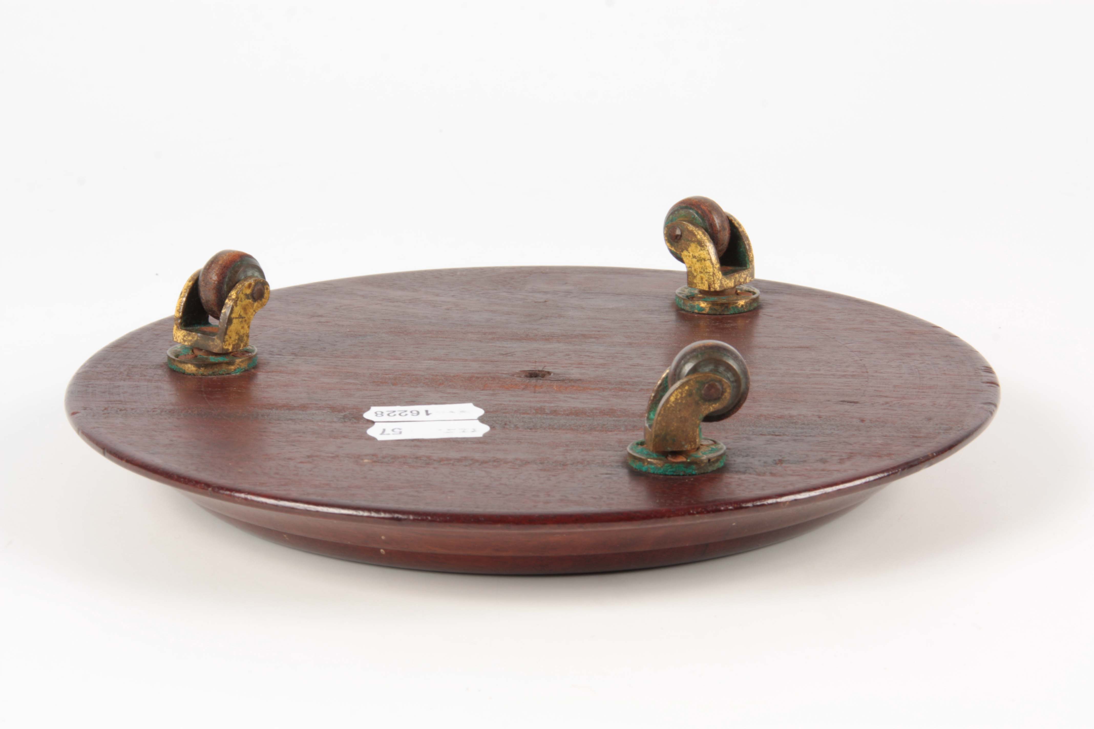 A GEORGE III MAHOGANY TABLE BOTTLE COASTER of circular form with moulded border, raised on revolving - Image 3 of 3