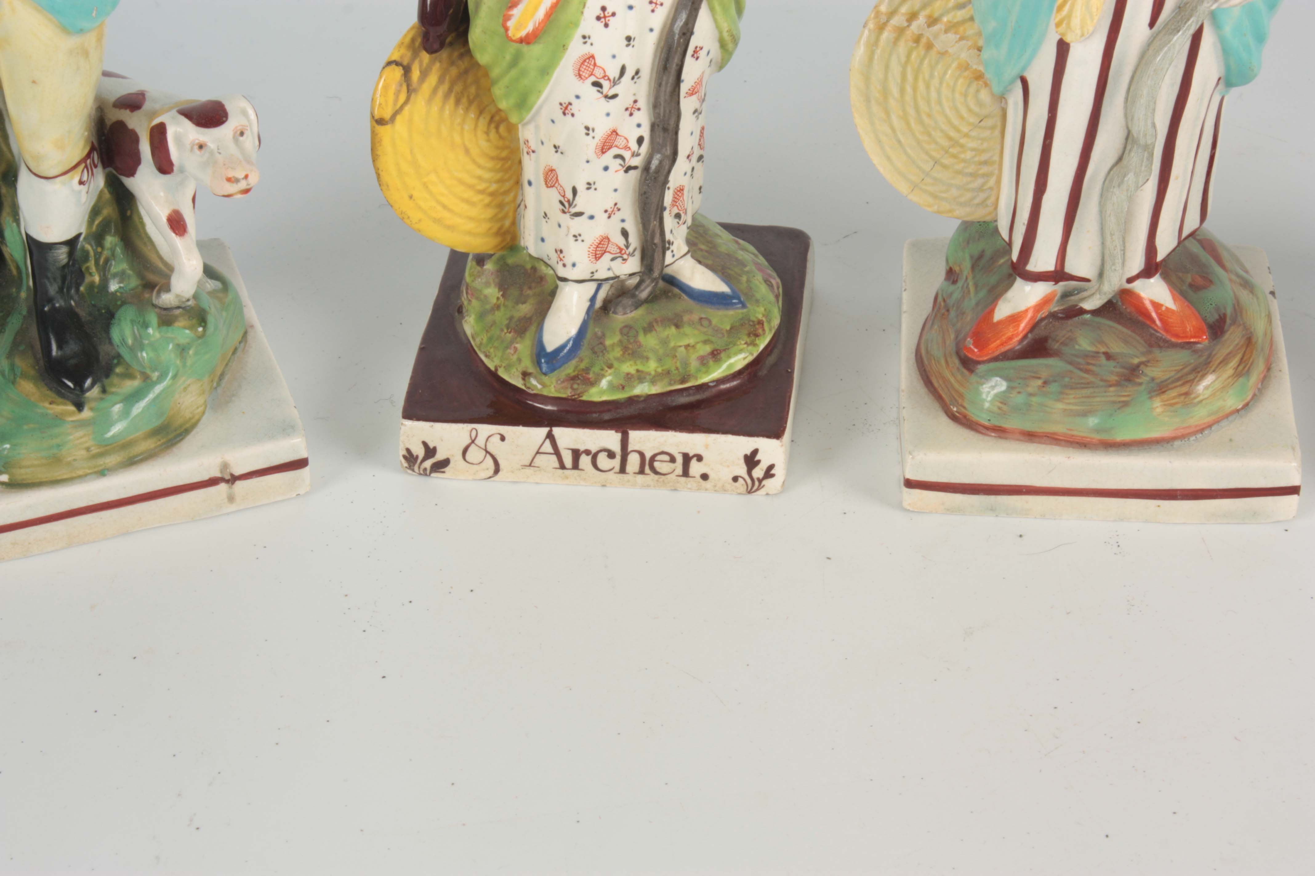 A PAIR OF 19TH CENTURY STAFFORDSHIRE STANDING FIGURES titled 'SPORTSMAN' and 'ARCHER' 18cm high - Image 2 of 4