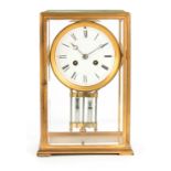 A 19TH CENTURY FRENCH GILT BRASS FIVE-GLASS MANTEL CLOCK the moulded one-piece case with hinged