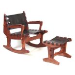 A 20TH CENTURY TEAK ROCKING CHAIR AND FOOTSTOOL BY ANGEL PAZMINO ECUADOR (CIRCA 1970) having an