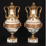 A GOOD PAIR OF 19TH CENTURY FRENCH ORMOLU MOUNTED VEINED MARBLE CASSOLETTES with ornate shaped