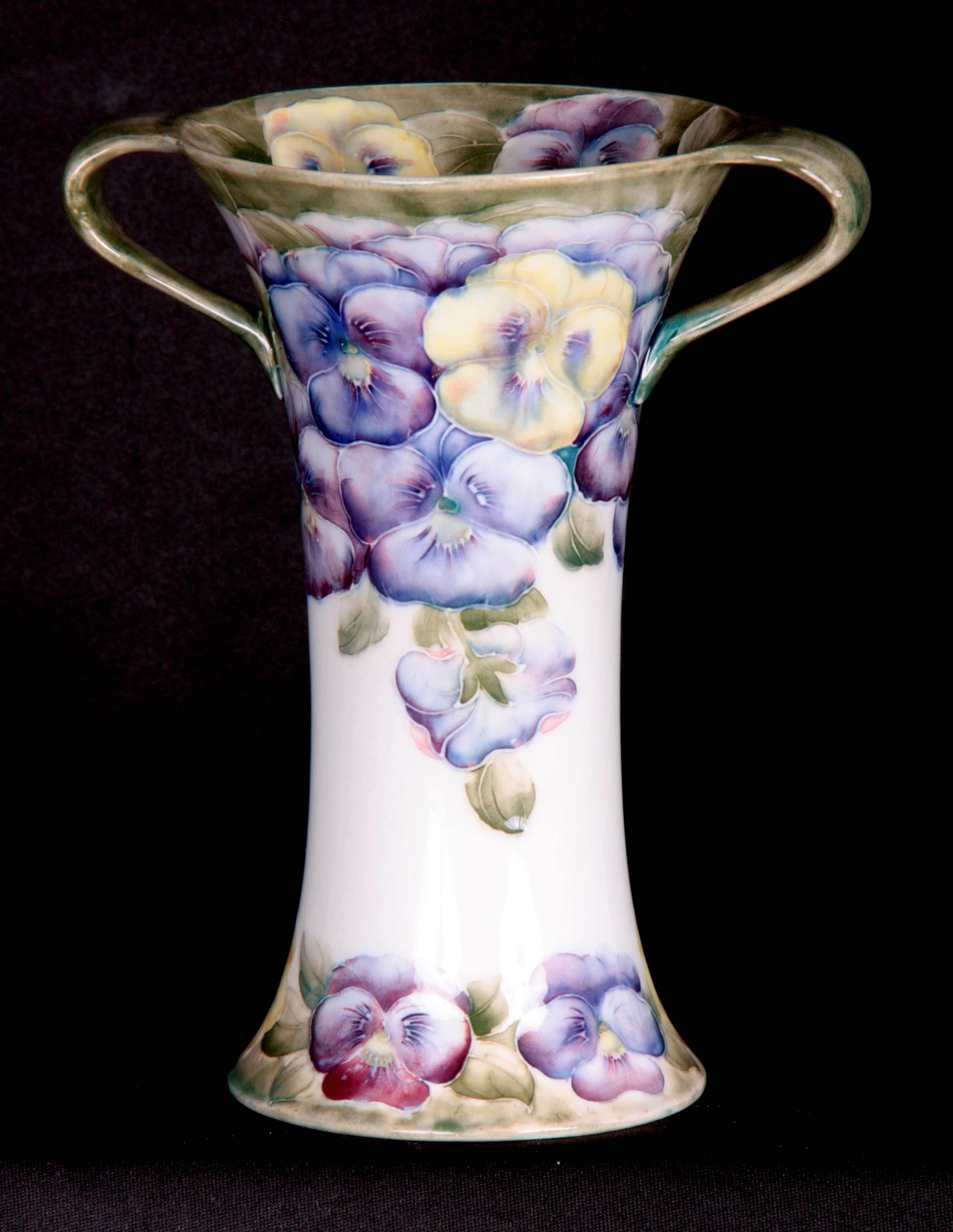 A LATE 19TH CENTURY MACINTYRE MOORCROFT FLARED TWO HANDLED VASE OF ART NOUVEAU DESIGN tube lined and