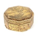 A MEIJI PERIOD JAPANESE OCTAGONAL GILT LACQUERED BRONZE BOX with a landscape setting having
