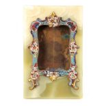 A 19TH CENTURY GREEN ONYX AND CHAMPLEVE ENAMEL PHOTO FRAME with rococo style decorated border to