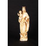 A 19TH CENTURY ANGLO PORTUGUESE CARVED IVORY SCULPTURE OF THE VIRGIN AND CHILD 18cm high