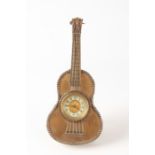 A LATE 19TH CENTURY FRENCH STRUNG MUSICAL INSTRUMENT NOVELTY MANTEL CLOCK modelled as a guitar