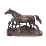 AFTER PIER JULES MENE A 19TH CENTURY BRONZE SCULPTURE OF A HORSE mounted on a naturalistic fenced