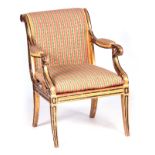 A REGENCY GILT GESSO AND EBONISED UPHOLSTERED SALON CHAIR in the manner of Holland & Sons with