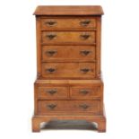 AN EARLY 18TH CENTURY STYLE HERING-BANDED BURR WALNUT MINIATURE CHEST ON CHEST fitted four long